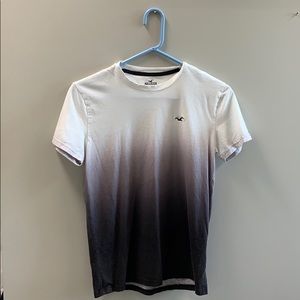 a white faded black hollister tee shirt
